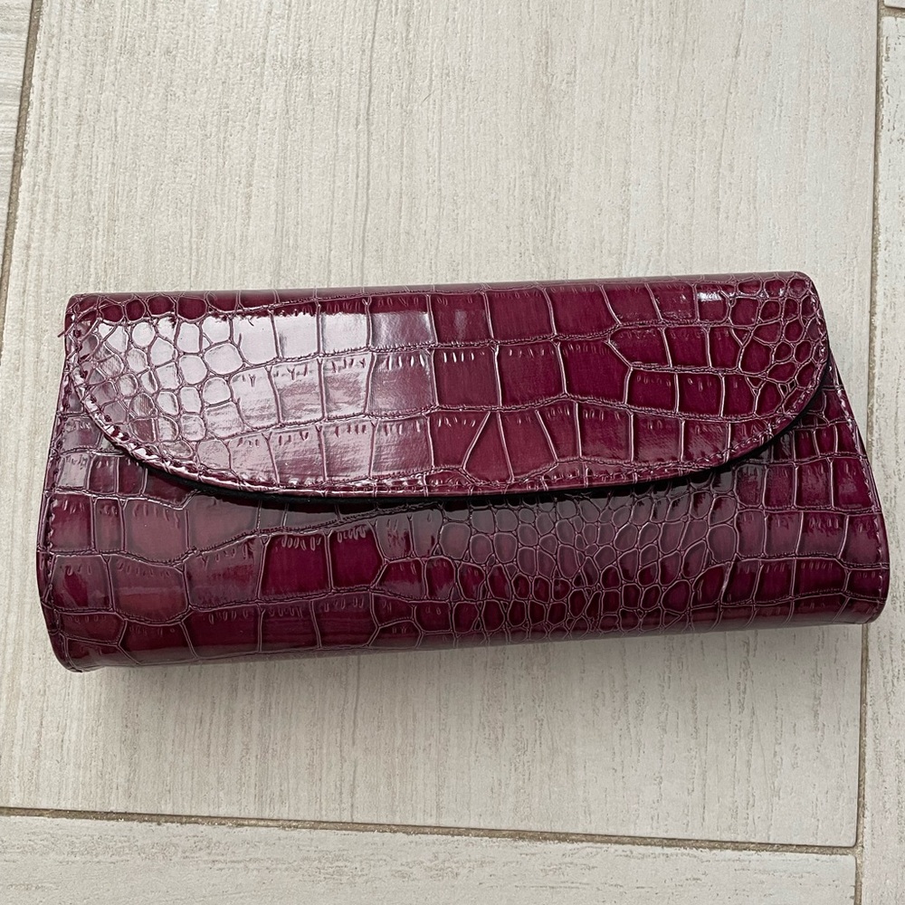 Faux snake skin clutch